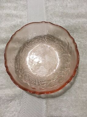 Vintage dusty rose/pink candy dish with Roses around the bottom rim.